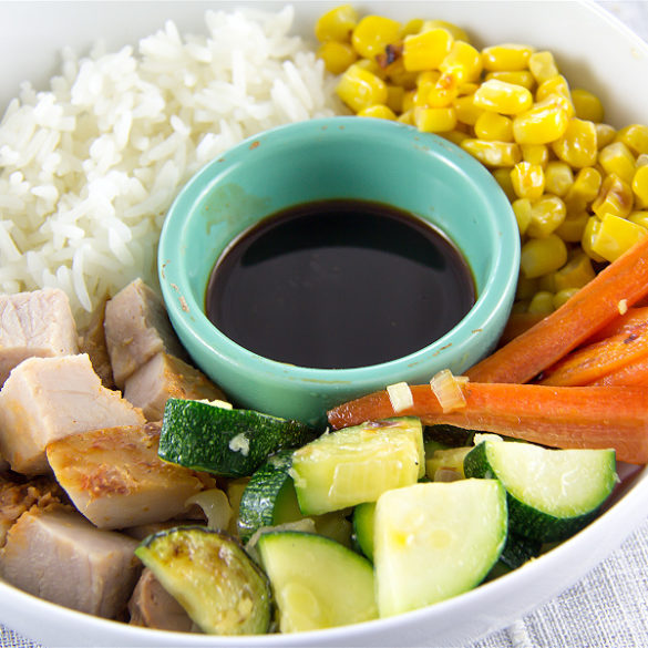 leftover pork loin recipe with rice and vegetables in a bowl