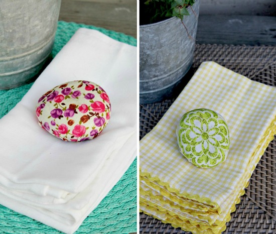 Napkin weights made out of rocks and fabric.