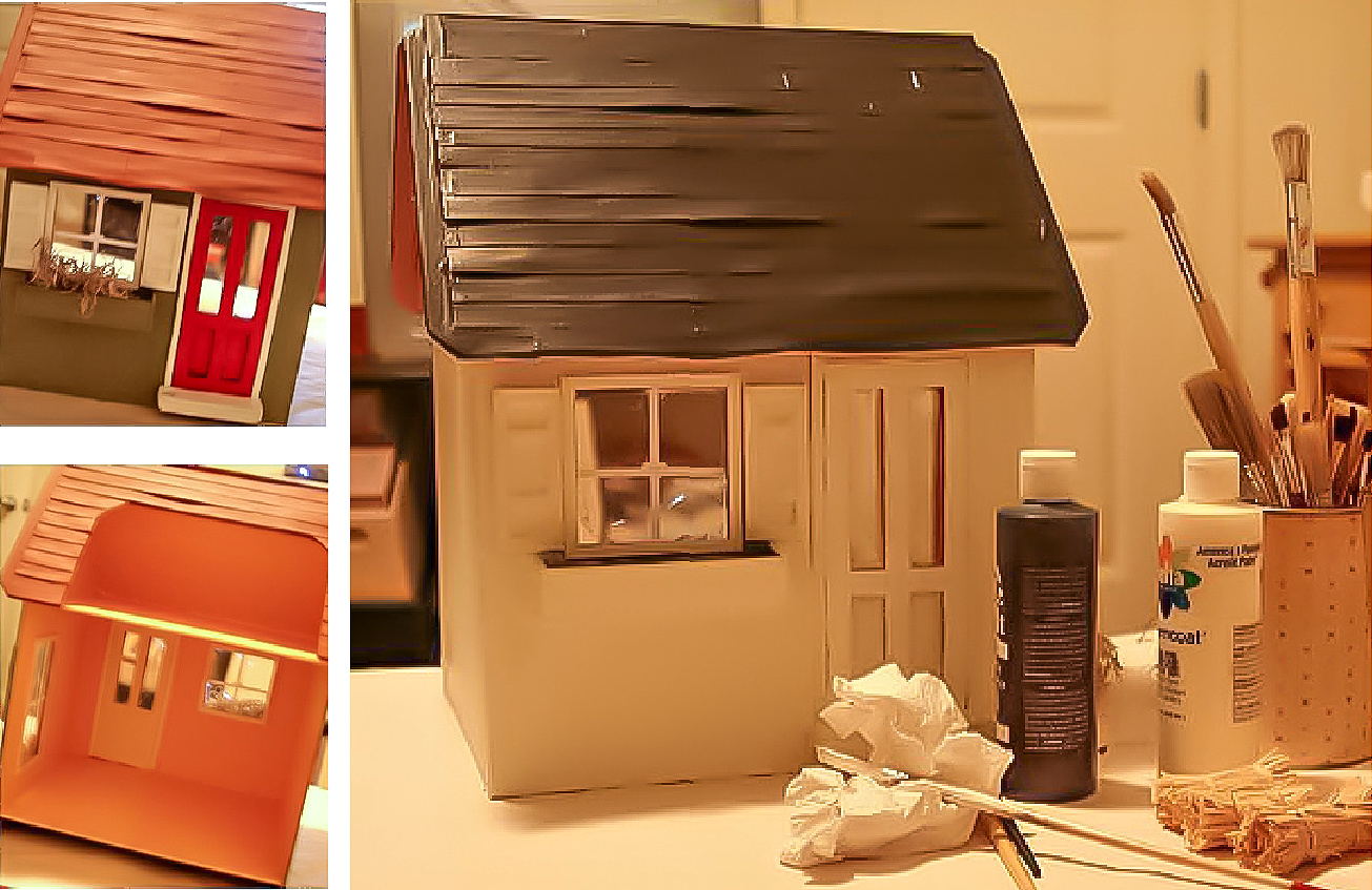 An old wood dollhouse getting a makeover with paint.