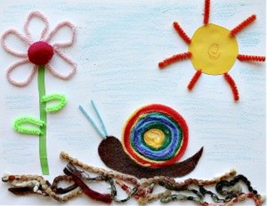 A snail art project for kids using yarn scraps