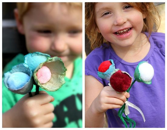 egg carton flower craft made using egg cartons, pipe cleaners, and pom poms.
