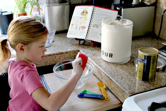 little girl cooking in the kitchen