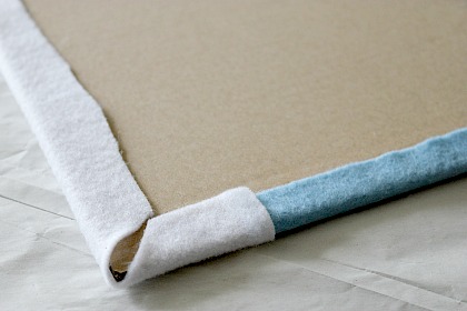 How to attach felt to cardboard to make a felt board.