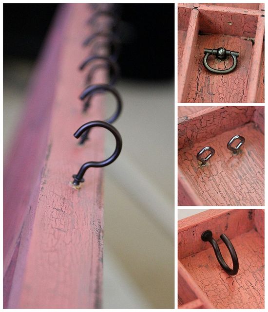 Hooks, eye screws, and decorative rings being added to a wall jewelry organizer