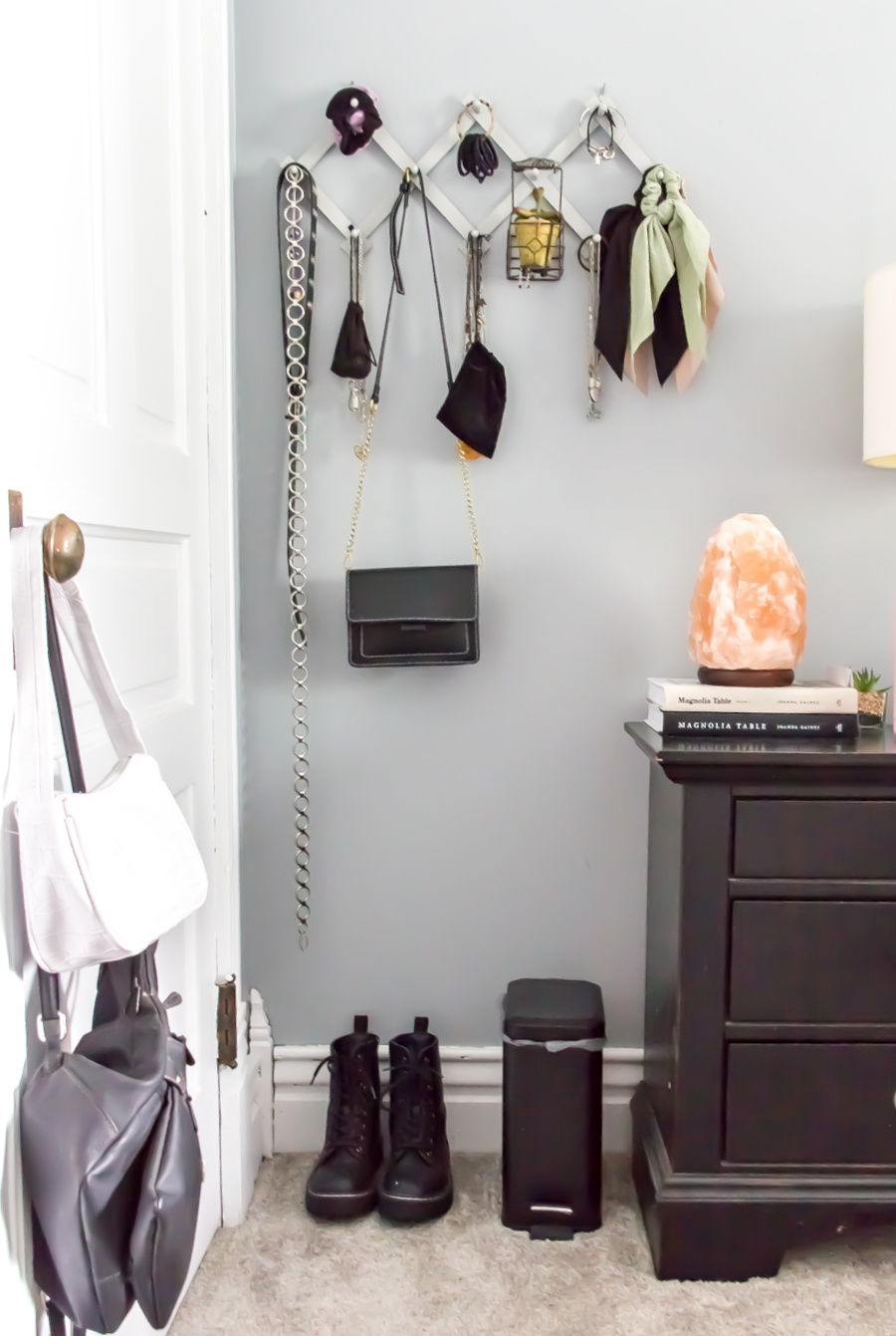 wall jewelry and accessory organizer in a teenage girls bedroom