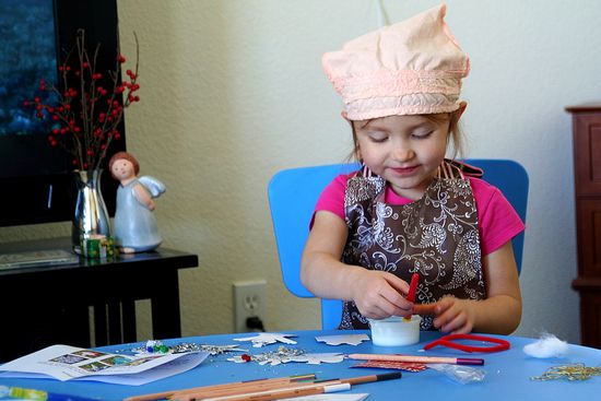 kids making paper ornaments