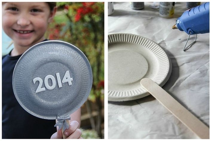 make sparkly shakers using paper plates and craft sticks.