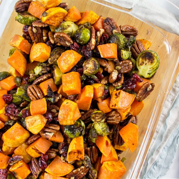 roasted sweet potatoes and brussels sprouts with pecans and cranberries