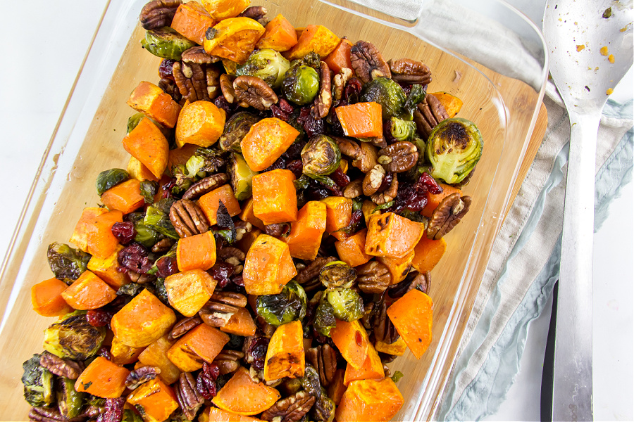 roasted sweet potatoes and brussels sprouts with pecans and cranberries