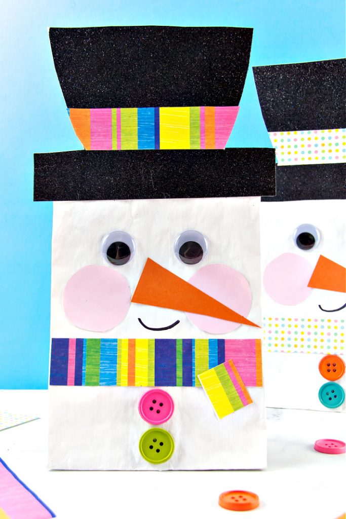 brown paper bag snowman craft for kids to make