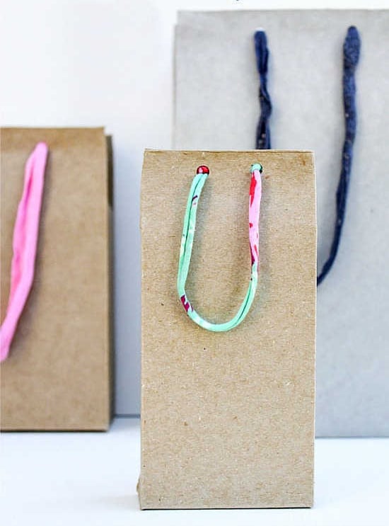 make gift bags out of cardboard boxes from your pantry
