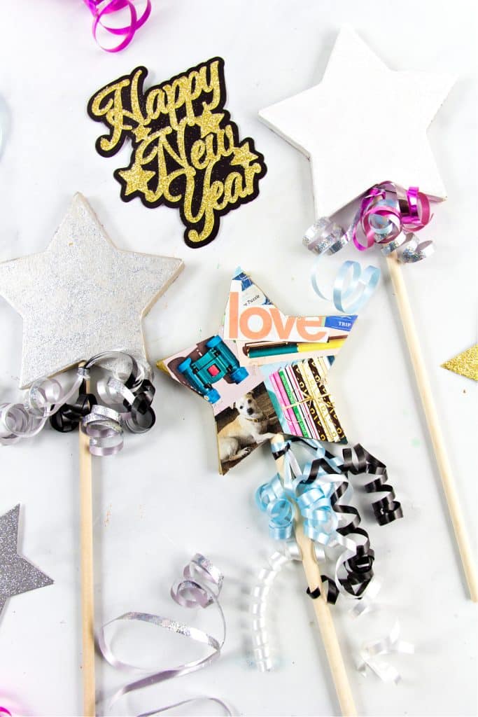 new years eve wishing wand craft made out of paper mache stars, magazine collage and wood dowel rod