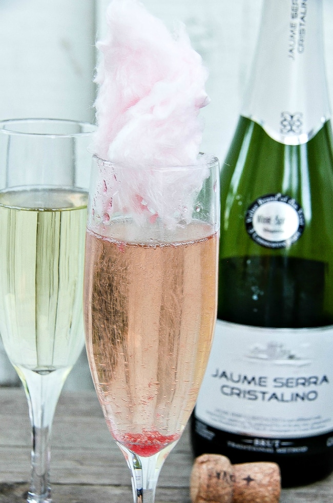 pink cotton candy added to sparkling wine for valentines day