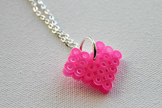a pink perler bead heart on a silver chain for valentines day