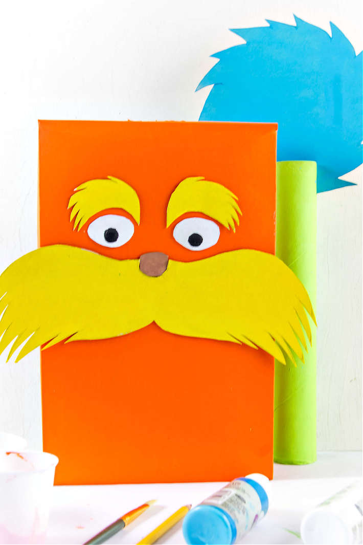 the lorax and truffula tree recycled cardboard craft for kids