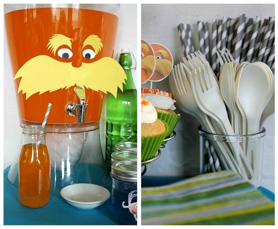 A drink dispenser made to look like The Lorax with orange drink inside. 