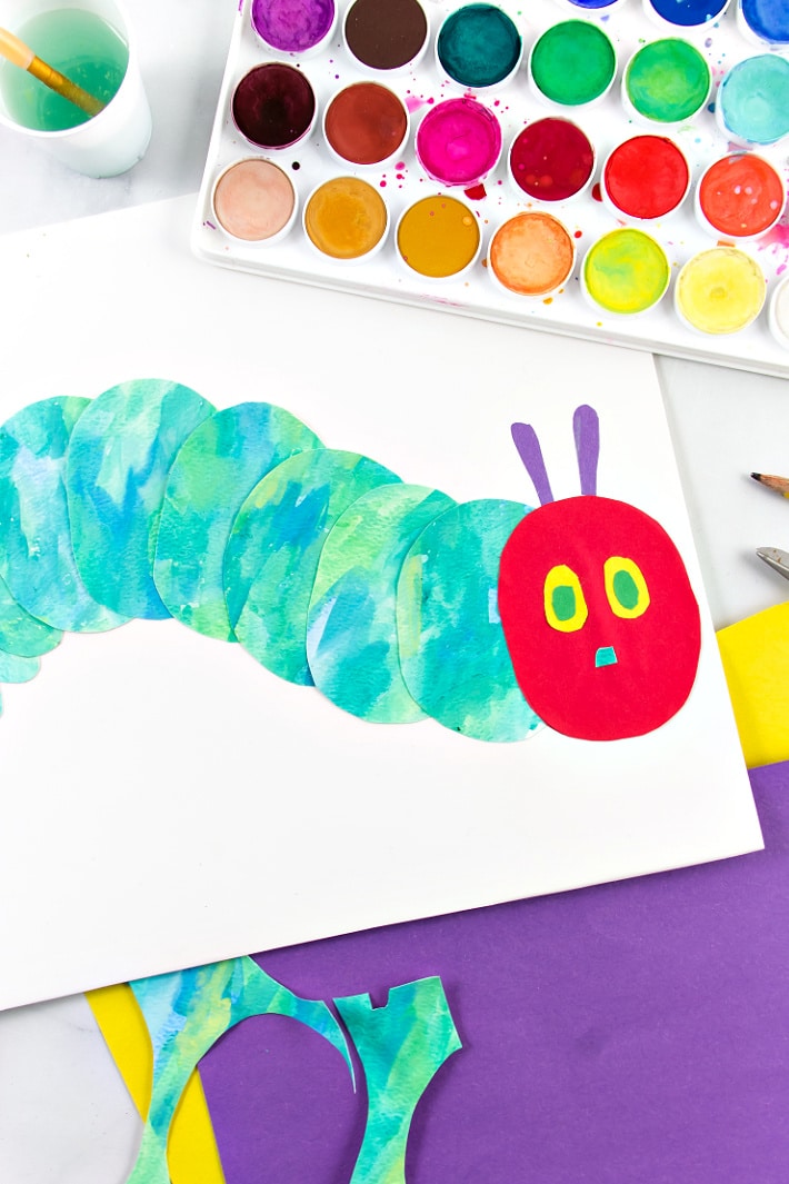 mixed media very hungry caterpillar craft using construction paper and watercolor paining