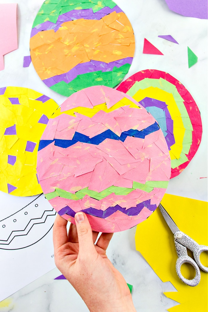 paper easter egg craft made using a construction paper mosaic pattern