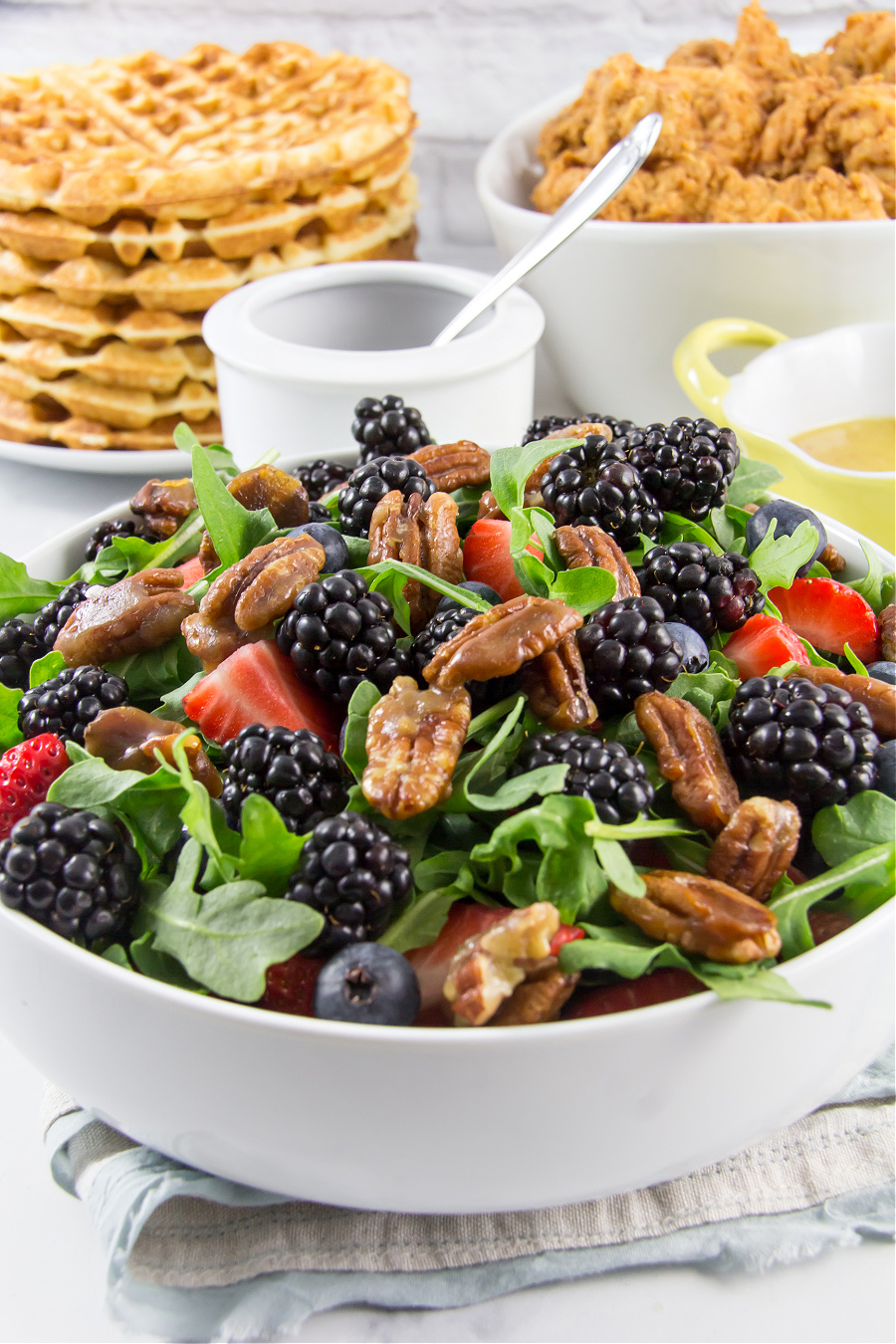 berry salad with arugula strawberries and blueberries