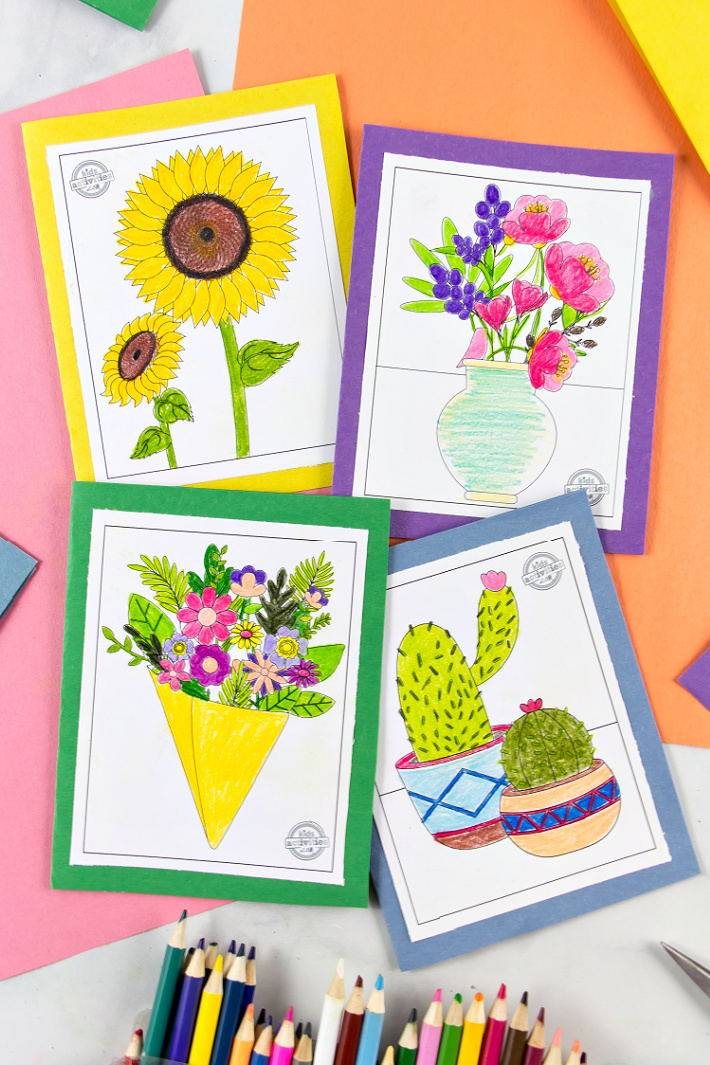 Flower greeting cards made for Mother's Day using coloring pages and construction paper.