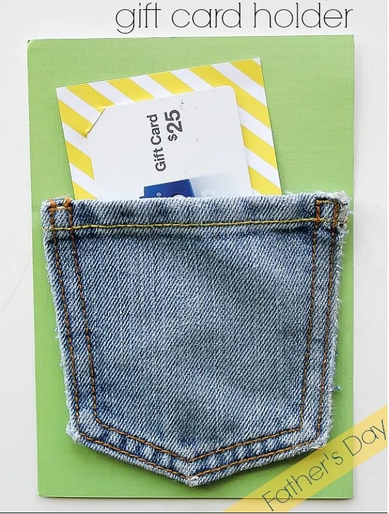 A gift card holder made out of card stock and a pocket from an old pair of jeans.