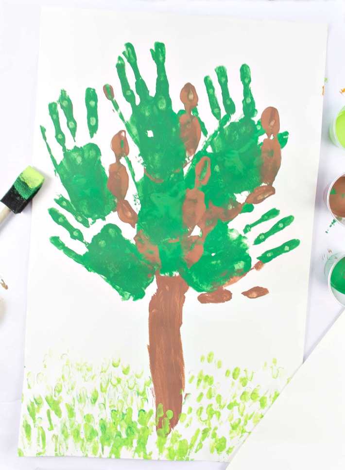A handprint tree art project for kids for Earth Day or fall.