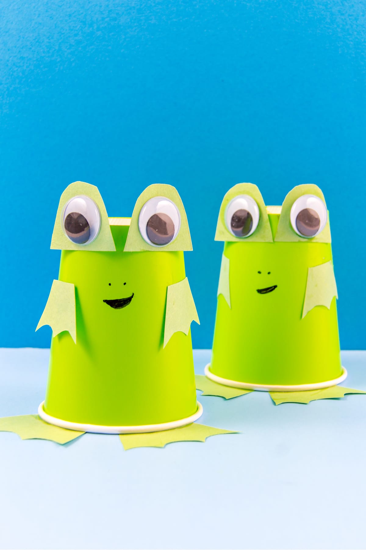 a green paper cup frog craft