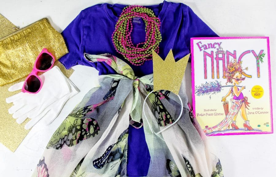 a pretty scarf wrapped around an over-sized t-shirt for a fancy nancy costume for kids