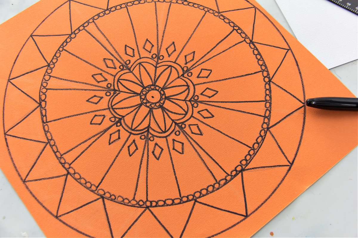 step 2 for making mandala art is to go over your mandala design with a sharpie