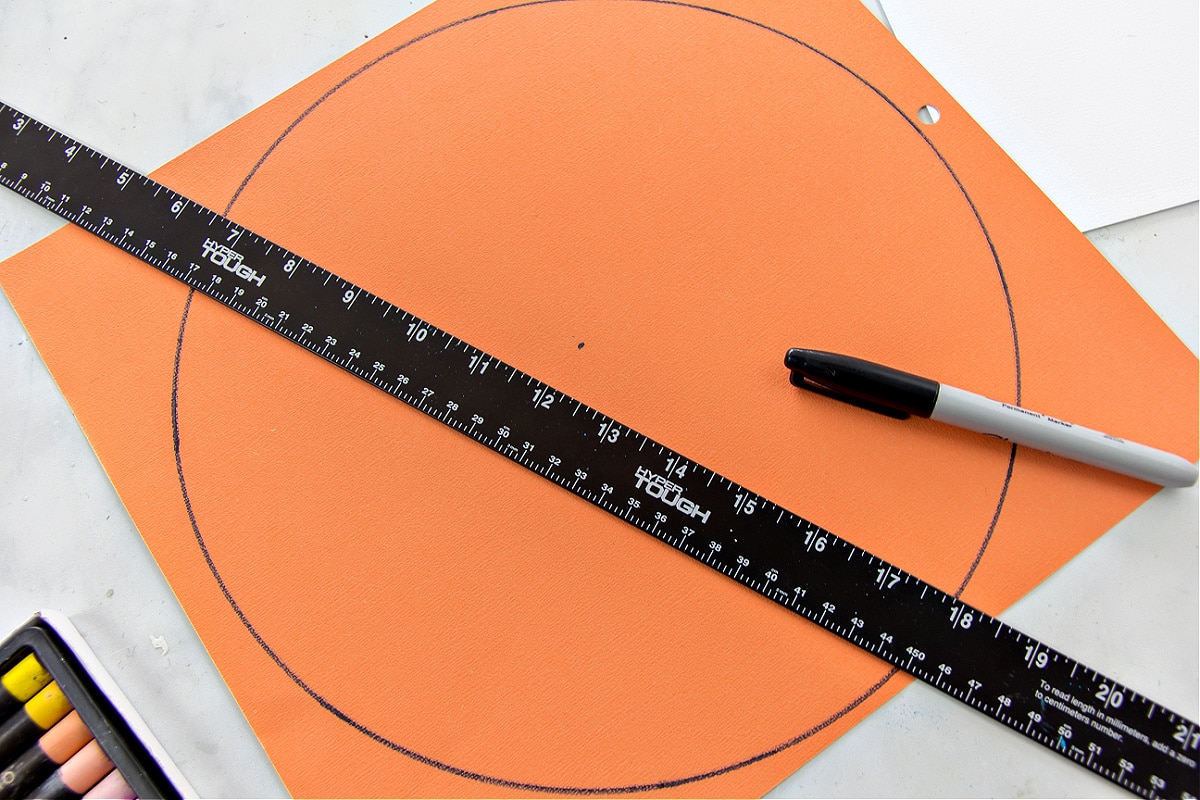 step 1 for making a mandala is to draw a circle on your paper and find the center point.