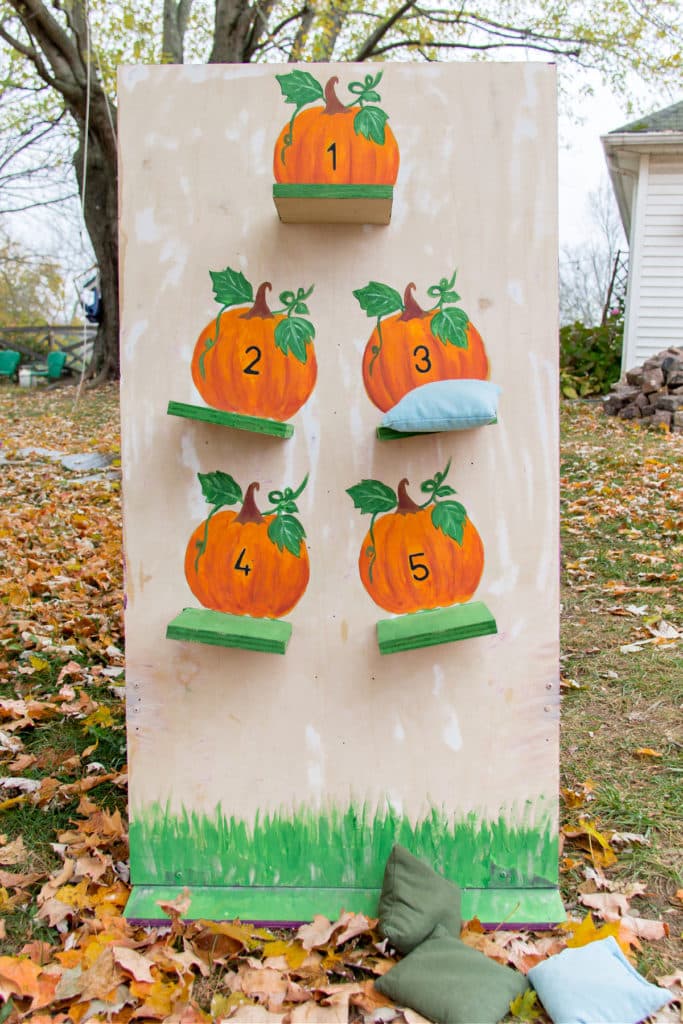 DIY fall festival pumpkin bean bag toss game for kids