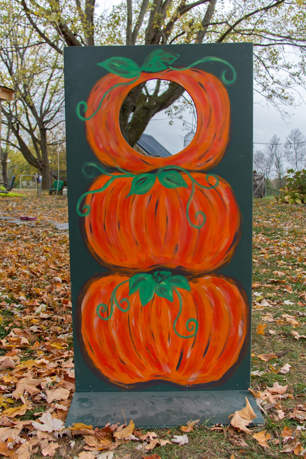 DIY pumpkin photo booth board for a fall festival