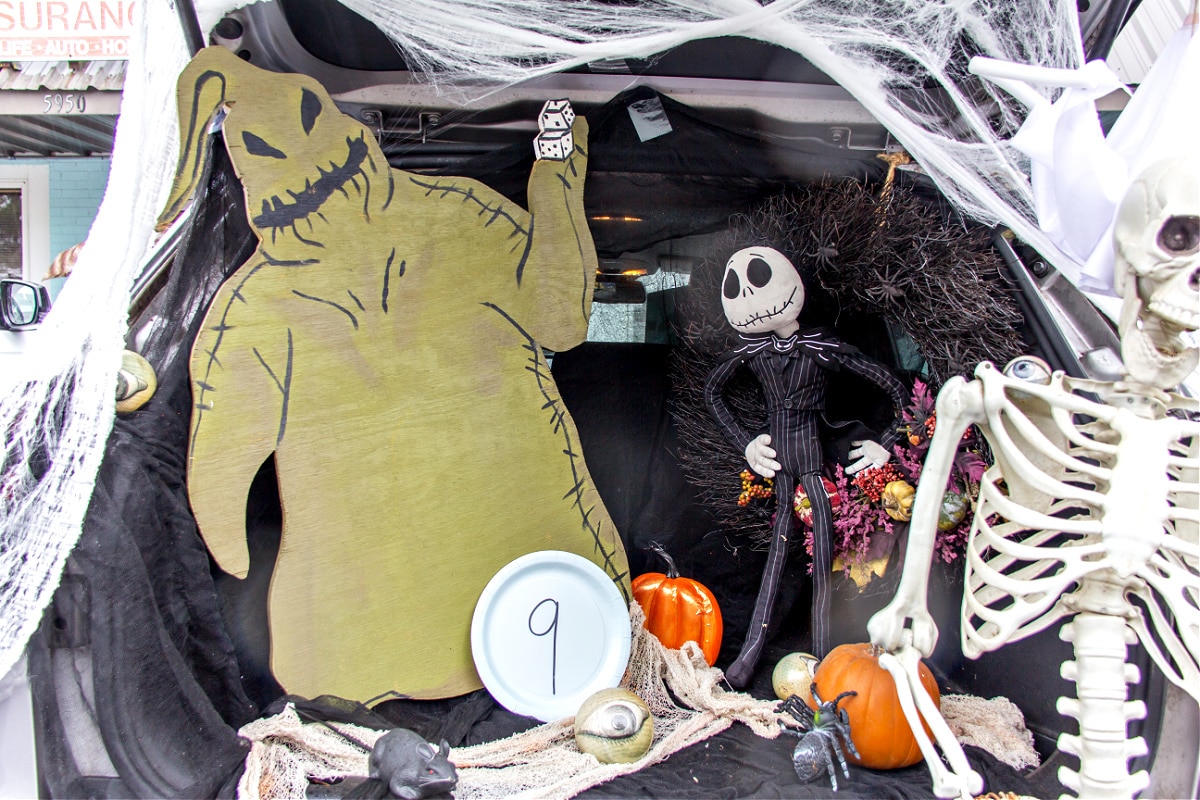 nightmare before christmas trunk or treat with an oogie boogie wood cutout, jack skellington decoration and more