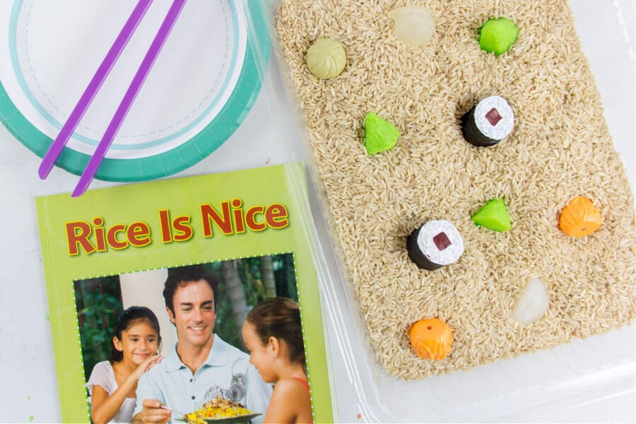teach kids how to use chopsticks with a fine motor activity paired with the book rice is nice