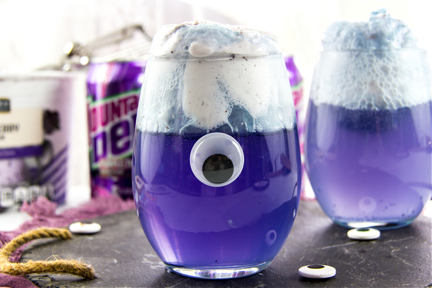 a purple float that looks like the Purple People Eater for a halloween party